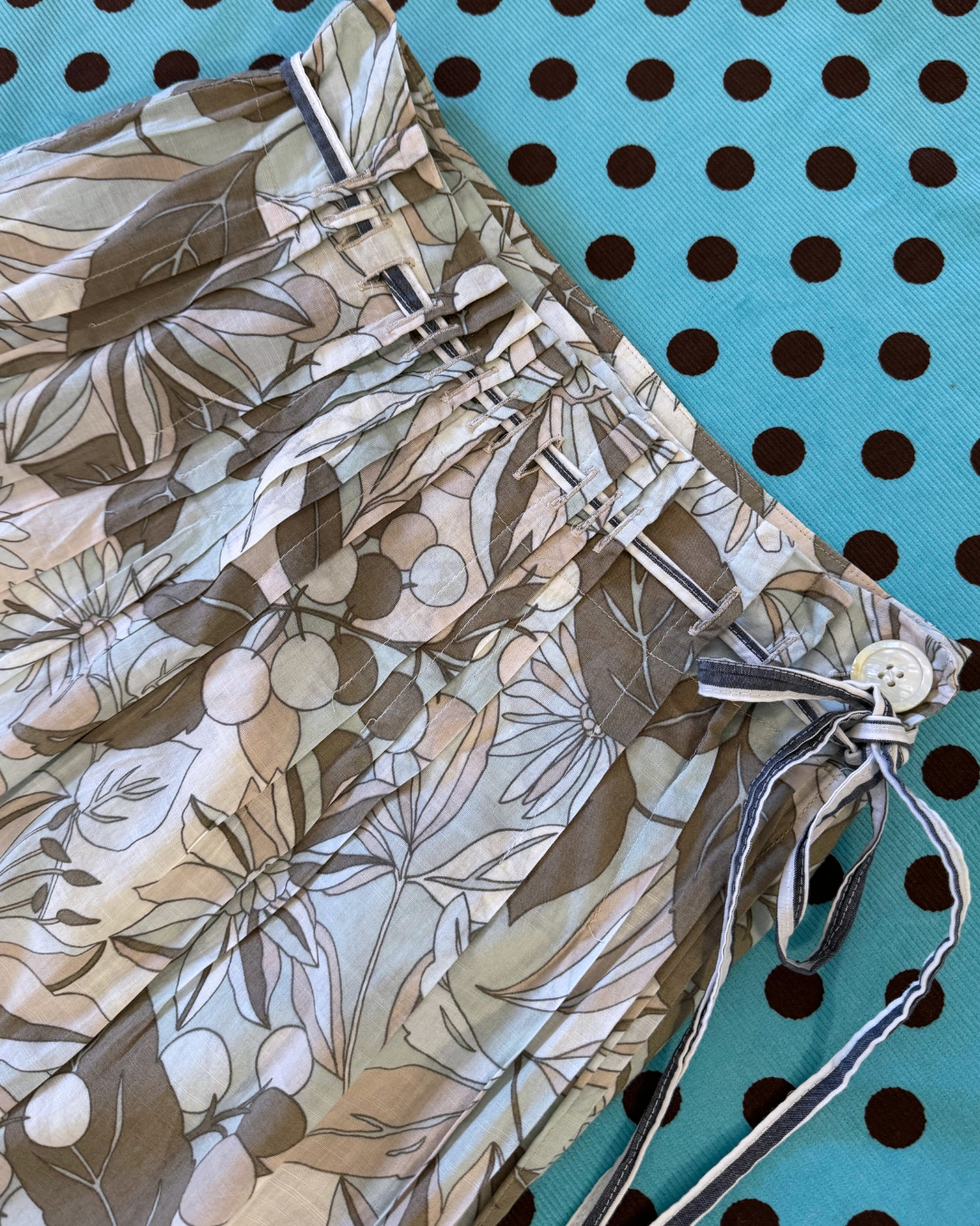 pleated floral midi skirt