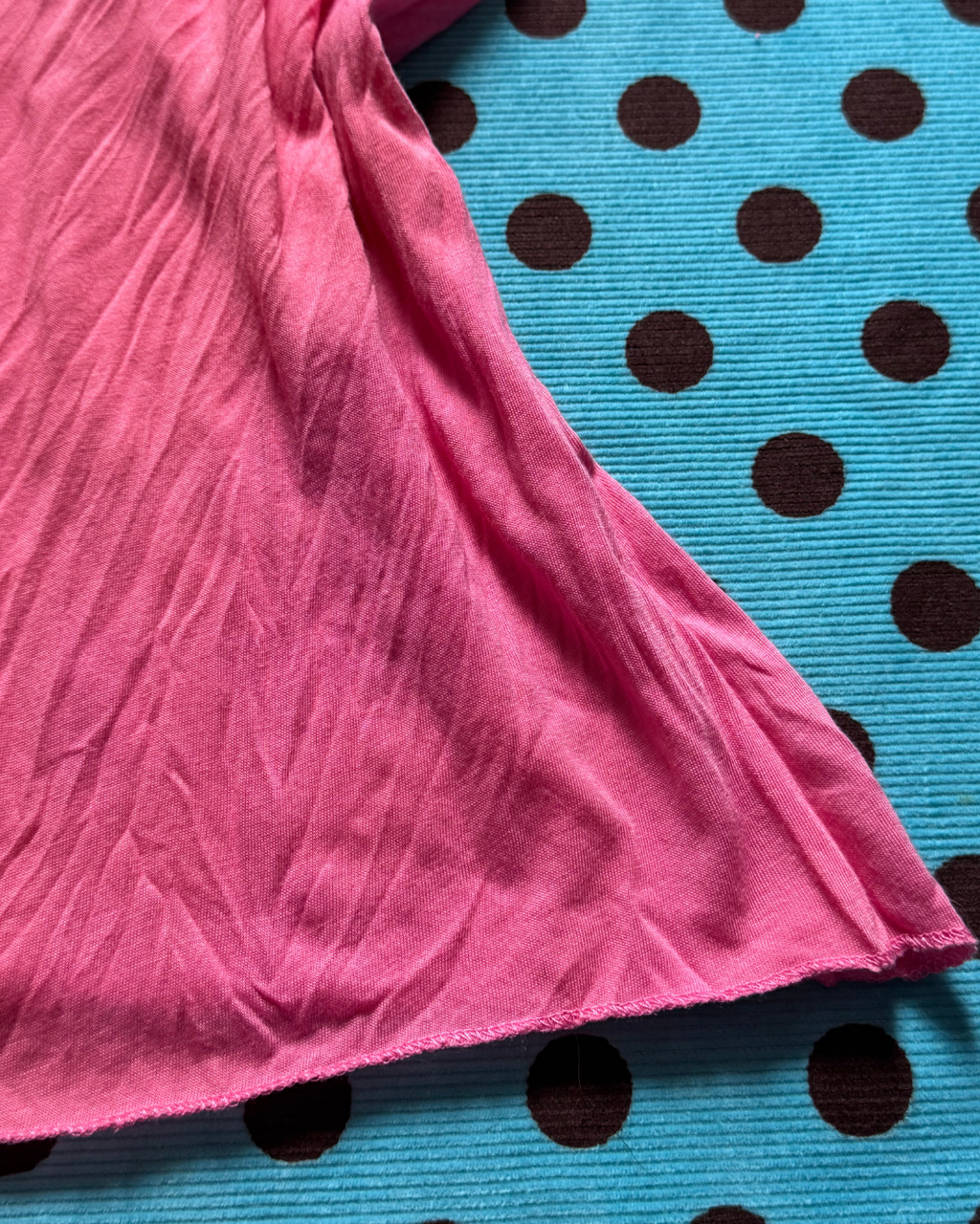 pink ruffled polka-dot cami