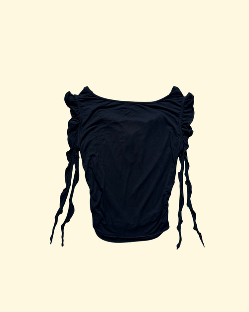 black ruffled top