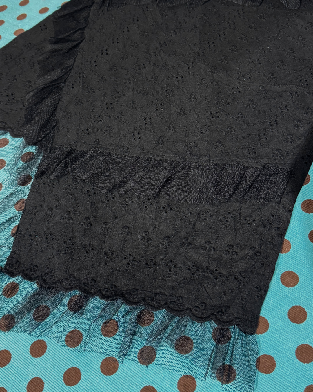 black eyelet asymmetrical skirt