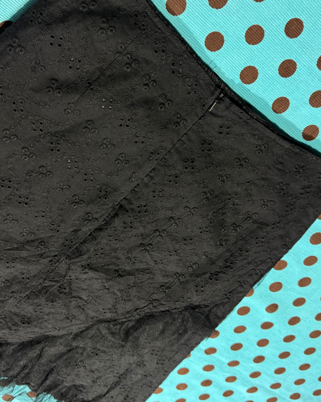 black eyelet asymmetrical skirt